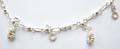 925. sterling silver anklet with multi mini pineapple and circle loop pattern decor along, a mini jiggle bell hanging at the end 
