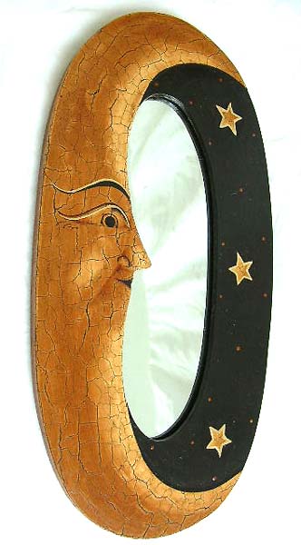 Elliptical wooden mirror with tan moon star on black sky design