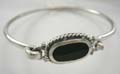Sterling silver bangle with a white/black mother of pearl seashell inlay oval pattern design in middle, randomly pick