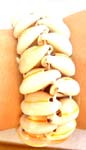 Multi mini white seashell froming a fashion bracelet with assorted color rope design