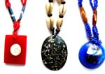 Beaded necklace with assorted genius shell pendant in different shape design