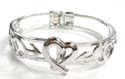 Fashion bangle motif in heart shape and double heart love arrow inlaid on each side