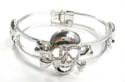 Wide fashion bangle with skull pattern design