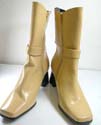 Creamy fashion boots with belt knot design made of shiny imatition leather
