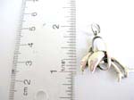 925.sterling silver pendant with dolphin jumping over the loop
