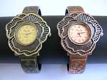 Copper and shiny yellow rose bangle watch with elegant carved-in pattern on bangle