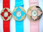 Embossed strap watch with round clock face and painting flower design