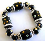 Fashion stretchy black bracelet with multi white yellow hand-painted Chinese lampwork glass bead and flat silver beads design 