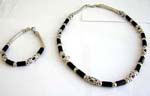 Fashion necklace set with long bali bead carved-in X pattern and black beads design, matched with a bracelet and lobster clasp for closure
