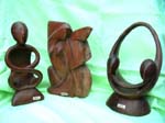 Assortment wooden abstract carving in genetic, yoga and kissing couple design