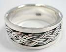 Thick banded 925. sterling silver ring with double braided center design 