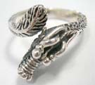 Trendy dragon motif 925. sterling silver ring with crafted eyes and etched in designs
