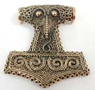 Bronzed hoop, dotted, and spiral patterned fancy pendant in tribal design 