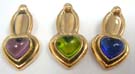 Heart shaped bronze pendant charms with crystal set in center. Comes in an assortment of colors picked randomly by our warehouse staff 