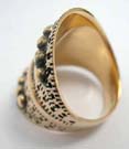Wide bronze ring with etched in dots and 3D circles 