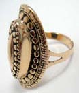 Oval shaped, 3 dimensional bronze ring with dots and circle imprints