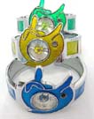 Fun, enamel dolphin motif watch with color on sides and miniature dolphin in time clock. Comes in and assortment of colors picked randomly by our warehouse staff 