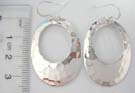 Large hollowed out oval shaped earrings in hammered 925. sterling silver design