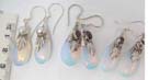 Crystal tear drop gems dangling from decorative 925. sterling silver casing. Comes in an assortment 