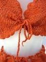 Sexy crochet garter orange skirt set crafted with cardigan bow tie on front matched a mini skirt design 