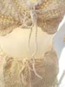 Linen white garter set with 3/4 sleeves and butterfly bow on front matched a mini skirt design