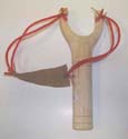 Wooden playing african sling shot