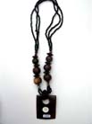 Crafted, squared wooden pendant on beaded multi string necklace