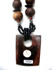 Crafted, squared wooden pendant on beaded multi string necklace