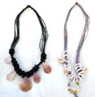 Balinese mother or pearl charms hanging on beaded necklace 