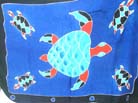 Colorful turtle image on royal blue sarong 