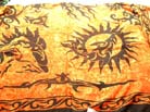 Tribal inspired dolphin and sun motif sarong in yellow and black