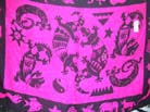 Gecko in tribal art design on pink sarong 