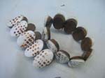 Bali wooden stretch bracelet with dotted design on oval segments 